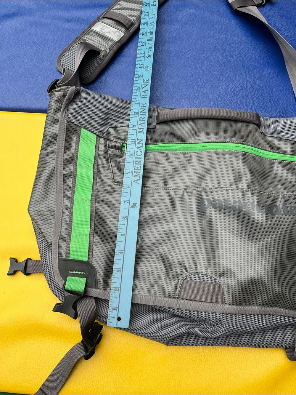 Patagonia’s Gray Messenger Bag with Green Accents older black hole